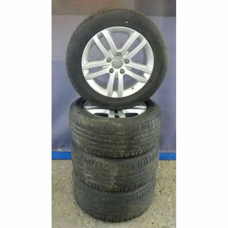 AUDI Q7 4L0 sada kol s pneu 255/55 R18 8,5Jx18H2 ET584L0601025B8Z8 - poškozené 2 disky Nakupujte Hned