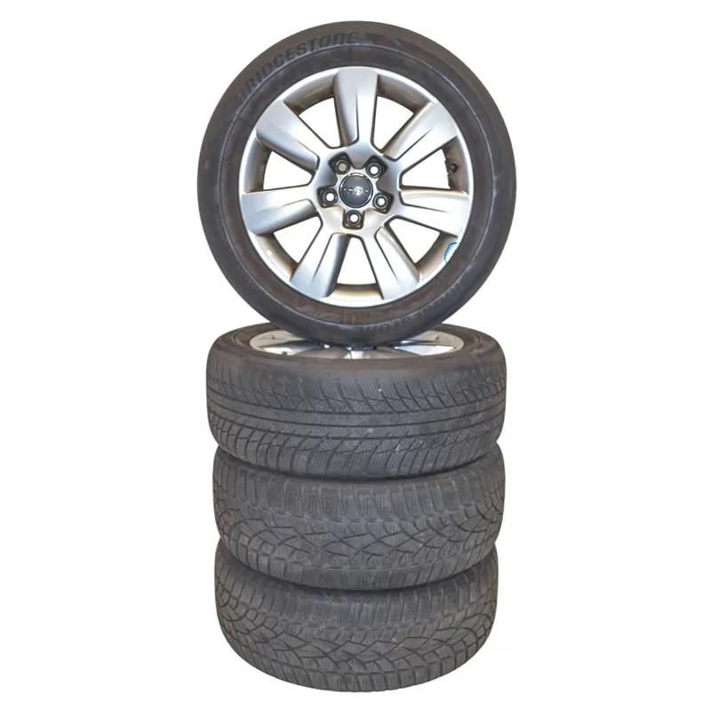 AUDI A6 4F0 sada kol s pneu 215/55 R17 7Jx17H2 ET344F0601025AS - lehce poškozený disk Nejlepší Cena